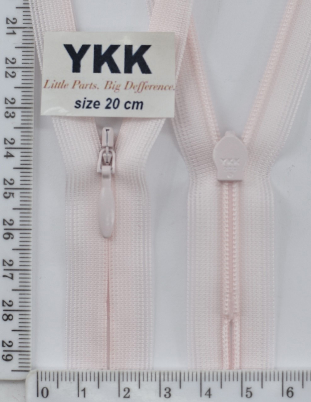 Блискавка спіраль №2 YKK Японія потайна нейлон 20см (511) біло-рожевий