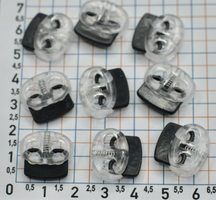 Фіксатор на 2шнура пласм під шнур Ф 2-4мм прозор чорний