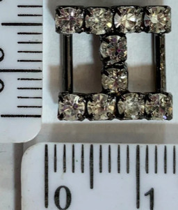 Пряжка перетяжка під тасьму шир 0,7 см черн