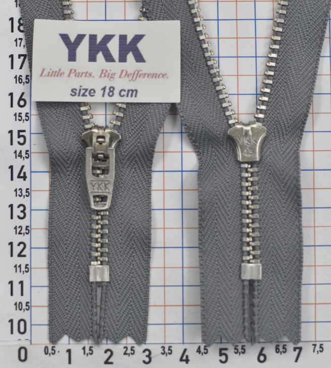 Блискавка метал джинсова № 4.5 сер звено YKK Японія 18см № 384 